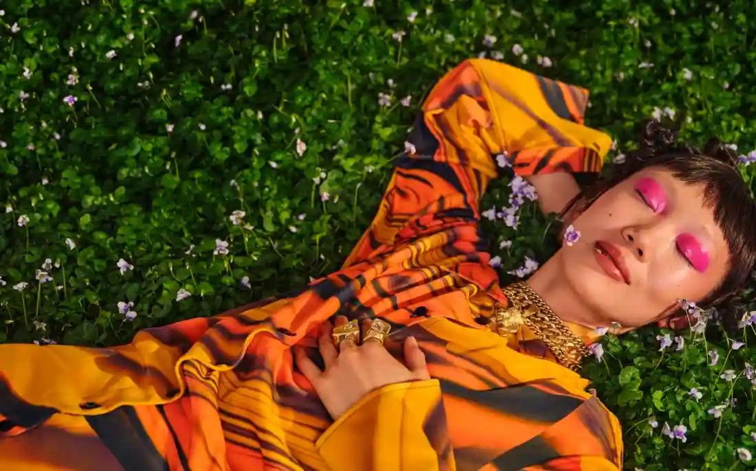 From Klarna, this sowns a woman sleeping on some plants I guess?
