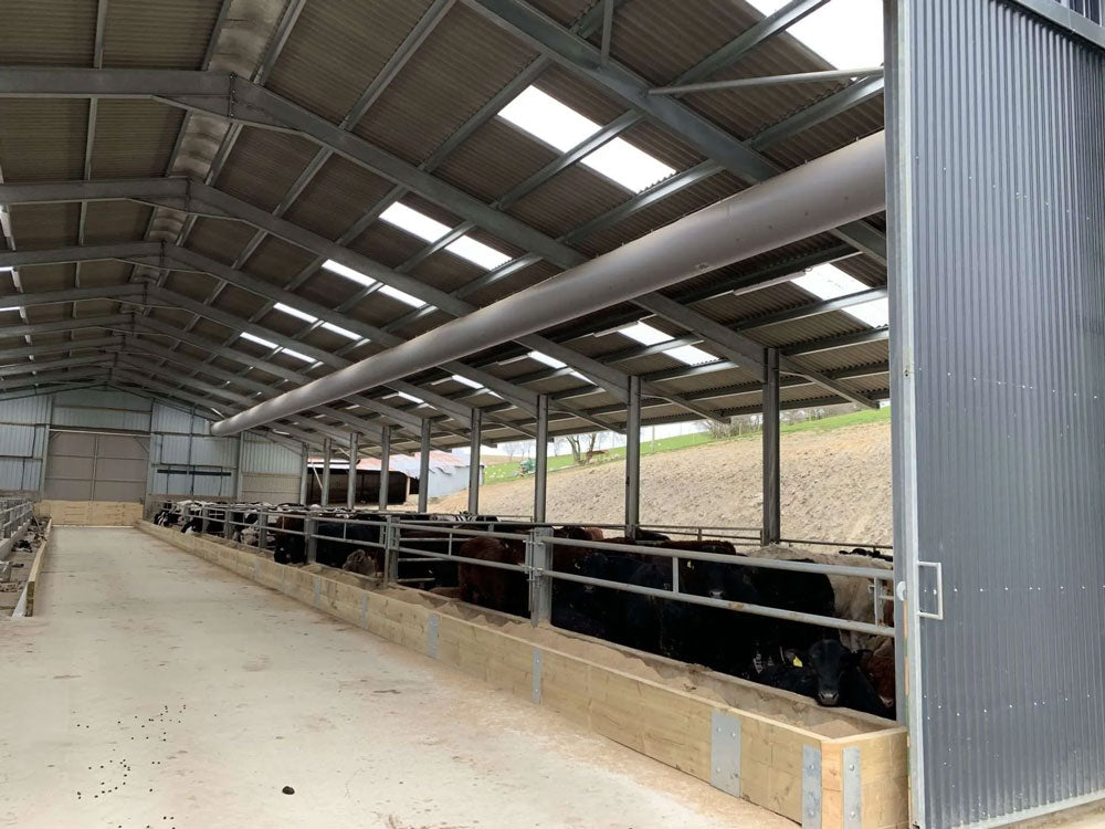 Galebreaker Venttube installed above cattle feed barriers