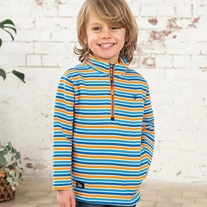 Child wearing a striped jumper; the stripes mess with my eyes