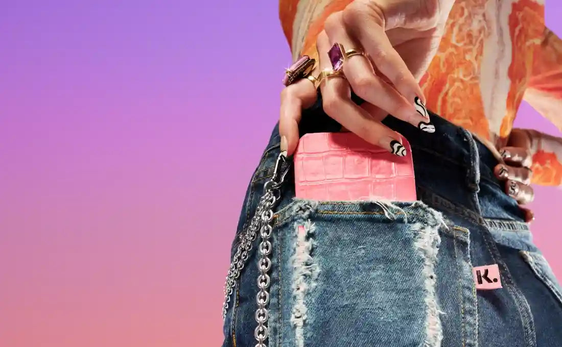 Showing a model putting her phone into her pocket, this is an image from Klarna